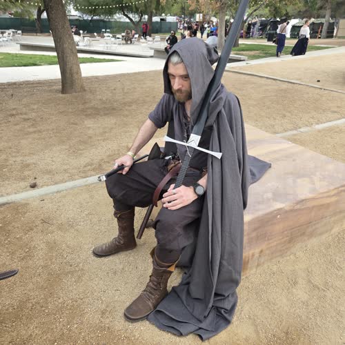 A guildmate at rest with his blade. Age of Chivalry, 2025.